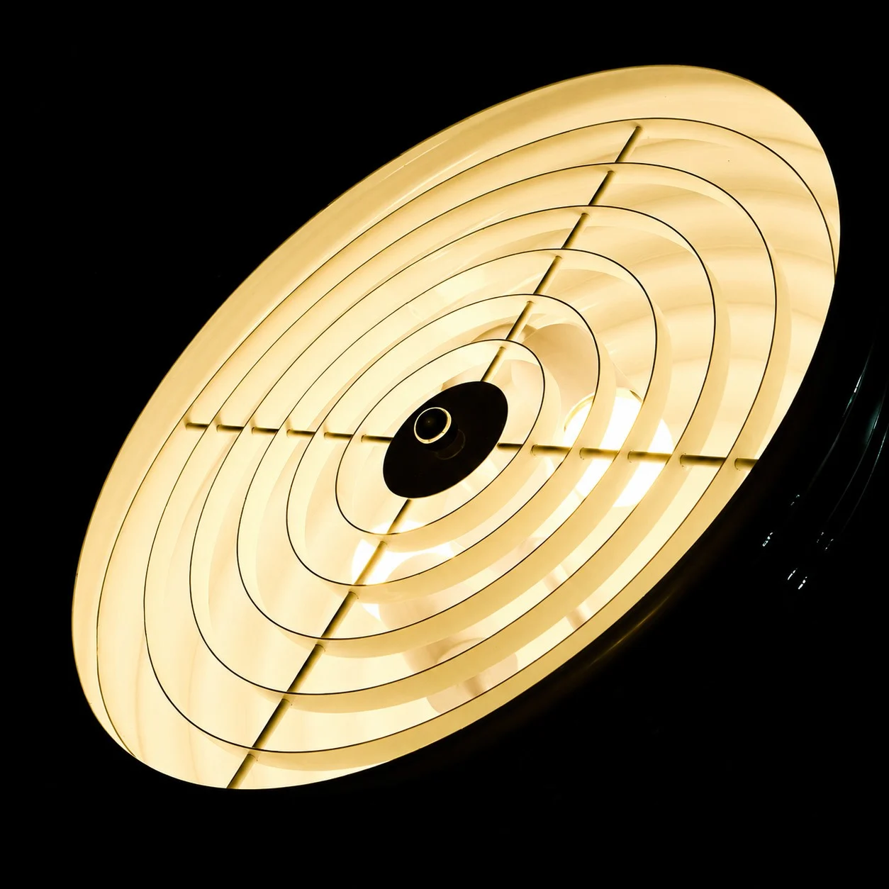 Warm illumination through the underside diffuser and guard detail