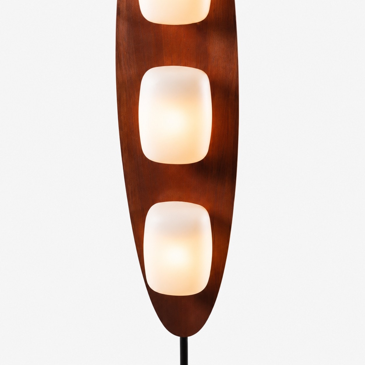 Walnut tone floor lamp glowing diffuser detail