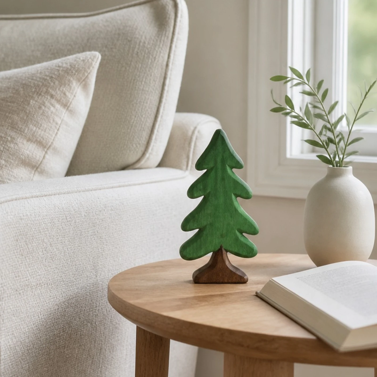 Pine tree ornament styled on a coffee table