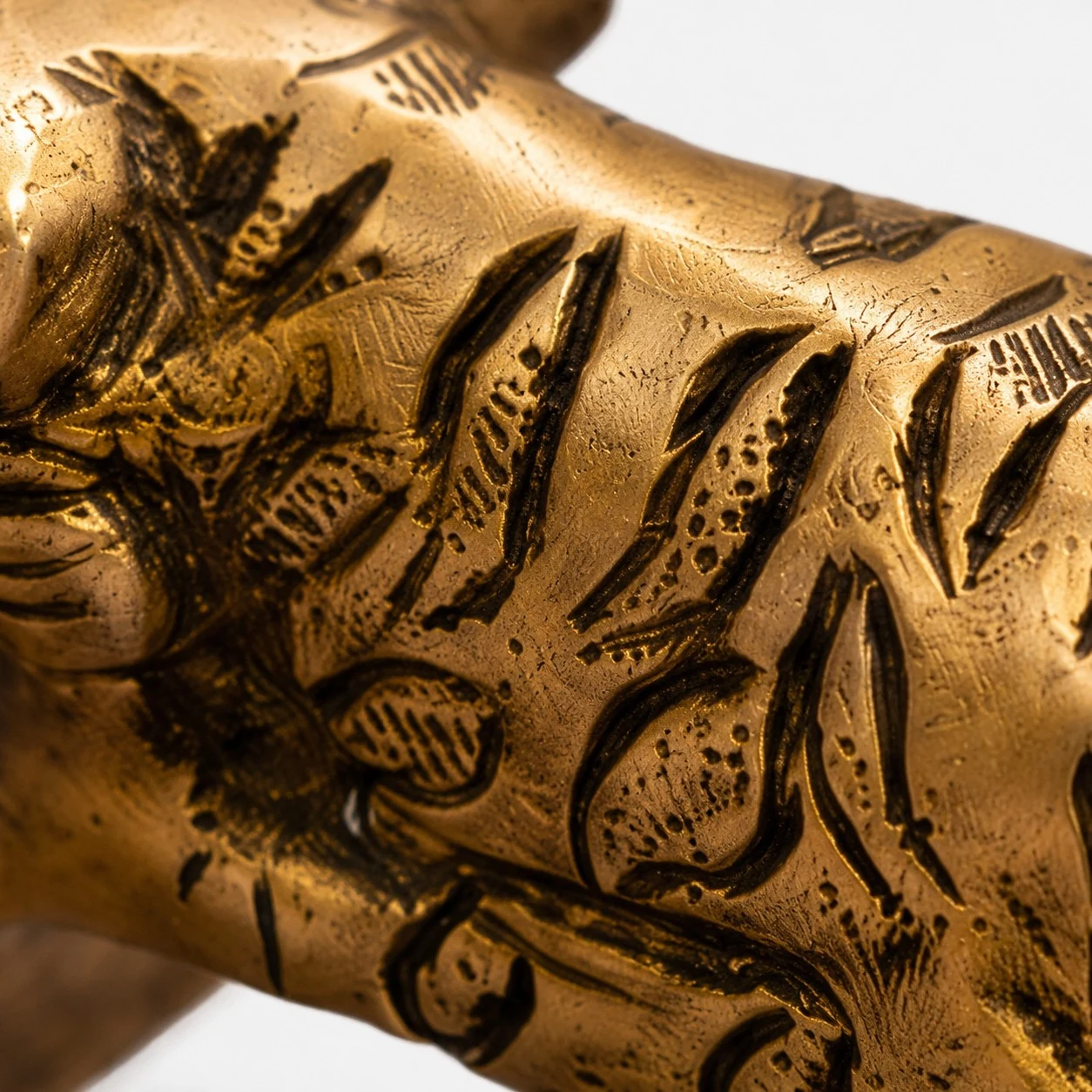 Handcrafted brass handle texture and carving detail