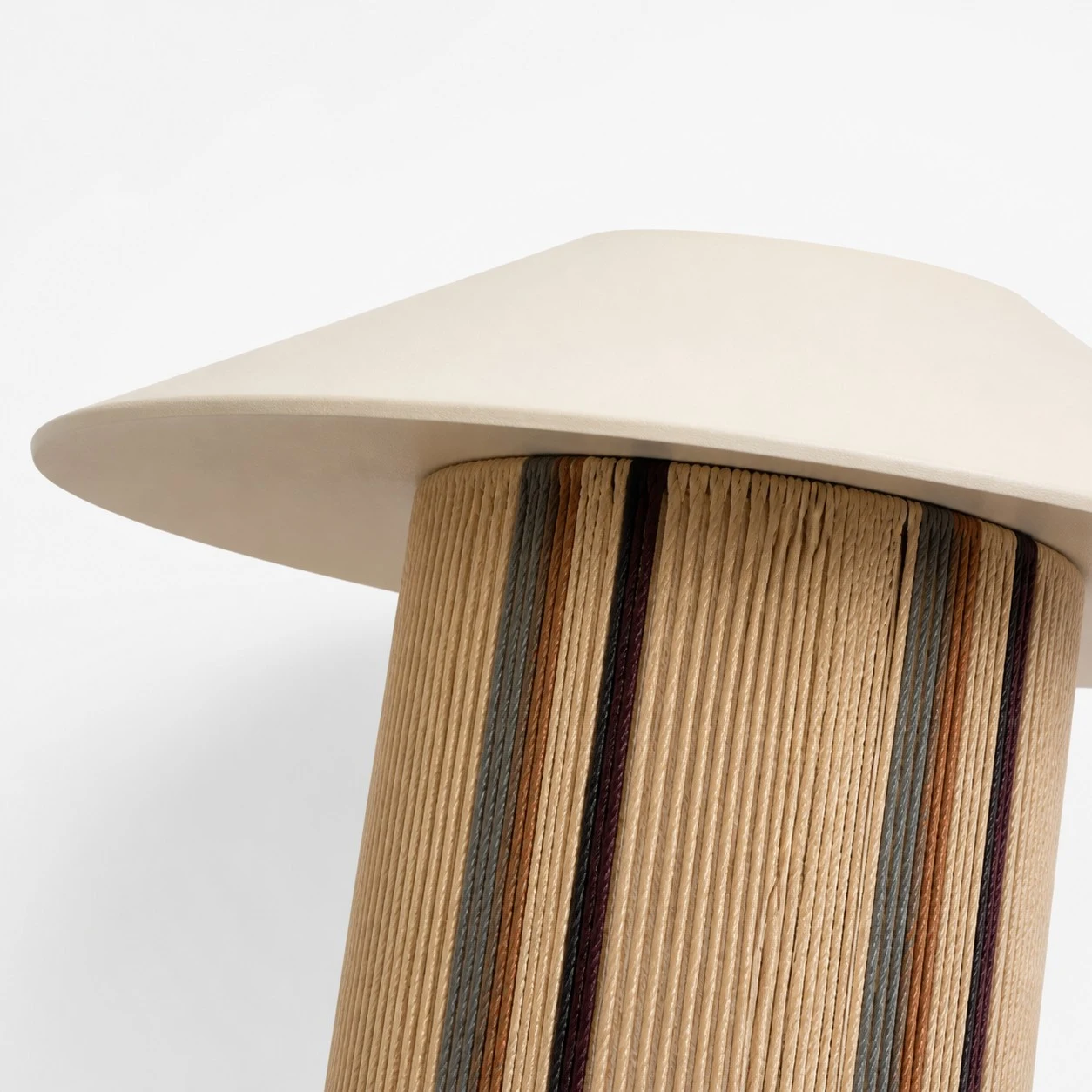 Pleated woven wall sconce shade and angled cap detail