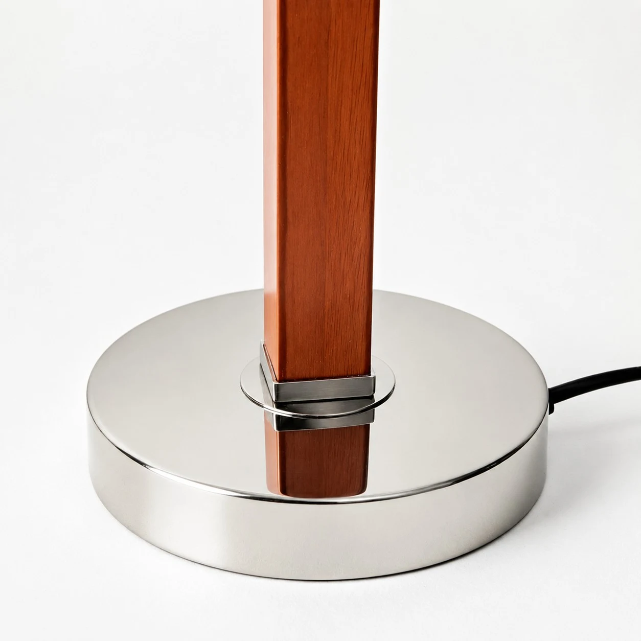 Round polished metal base detail