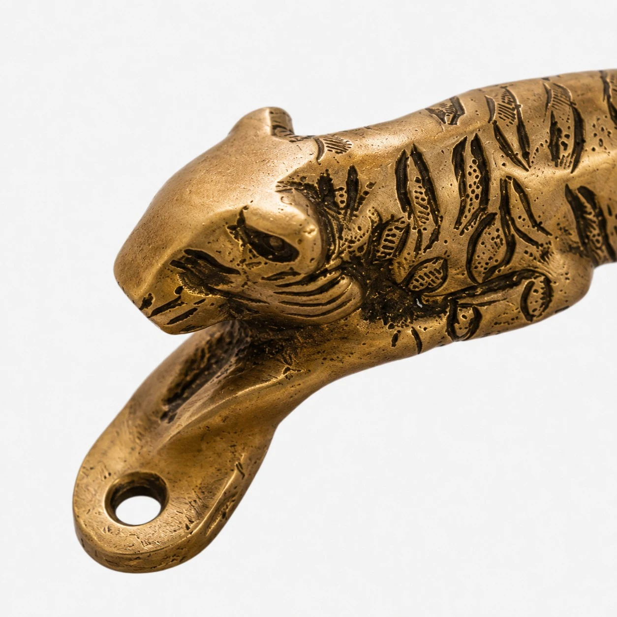 Handcrafted brass handle texture and carving detail