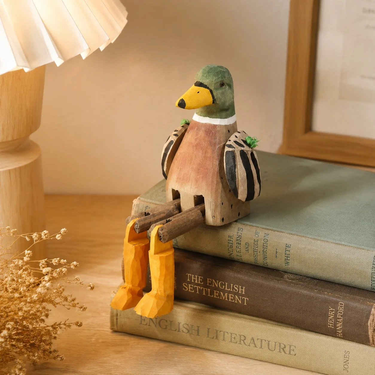 Wooden duck ornament displayed on a shelf edge