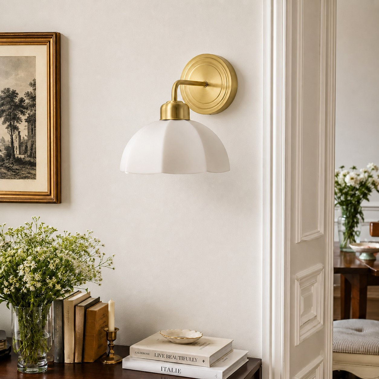 Milk glass wall lamp styled in a classic entryway