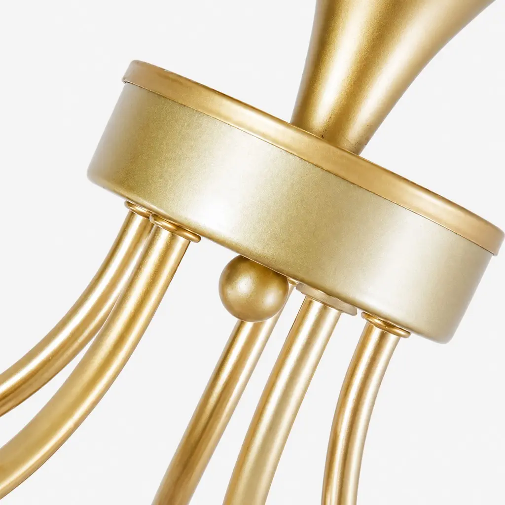 Gold metal arm junction detail