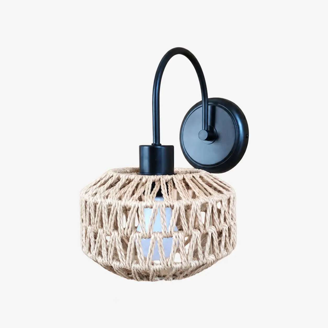 Shade B woven rattan wall sconce in matte black
