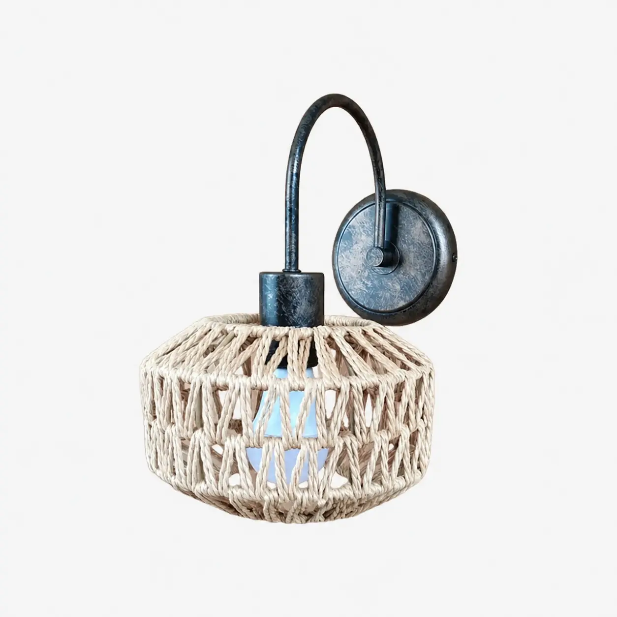 Shade B woven rattan wall sconce in antique brass