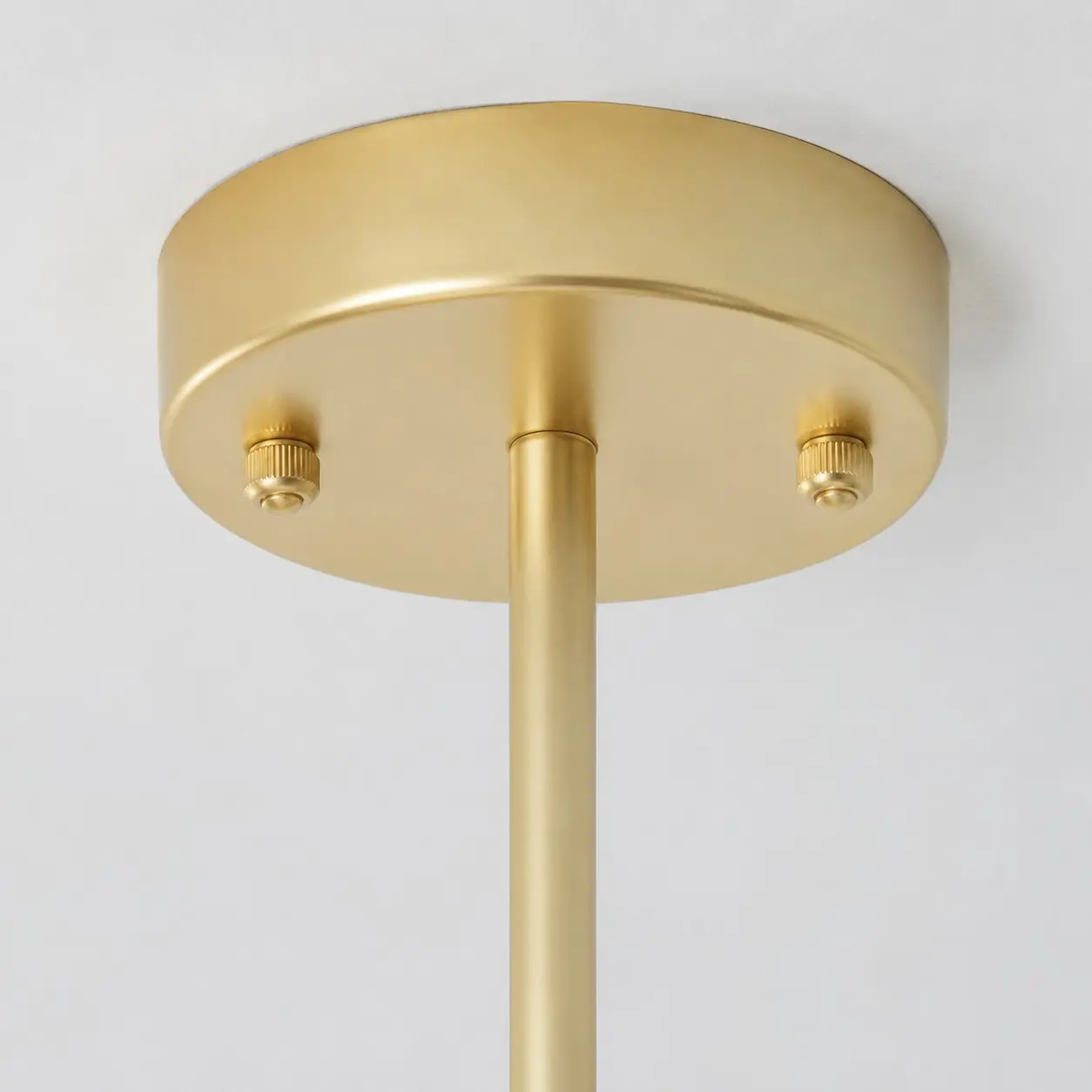 Gold ceiling canopy and downrod detail