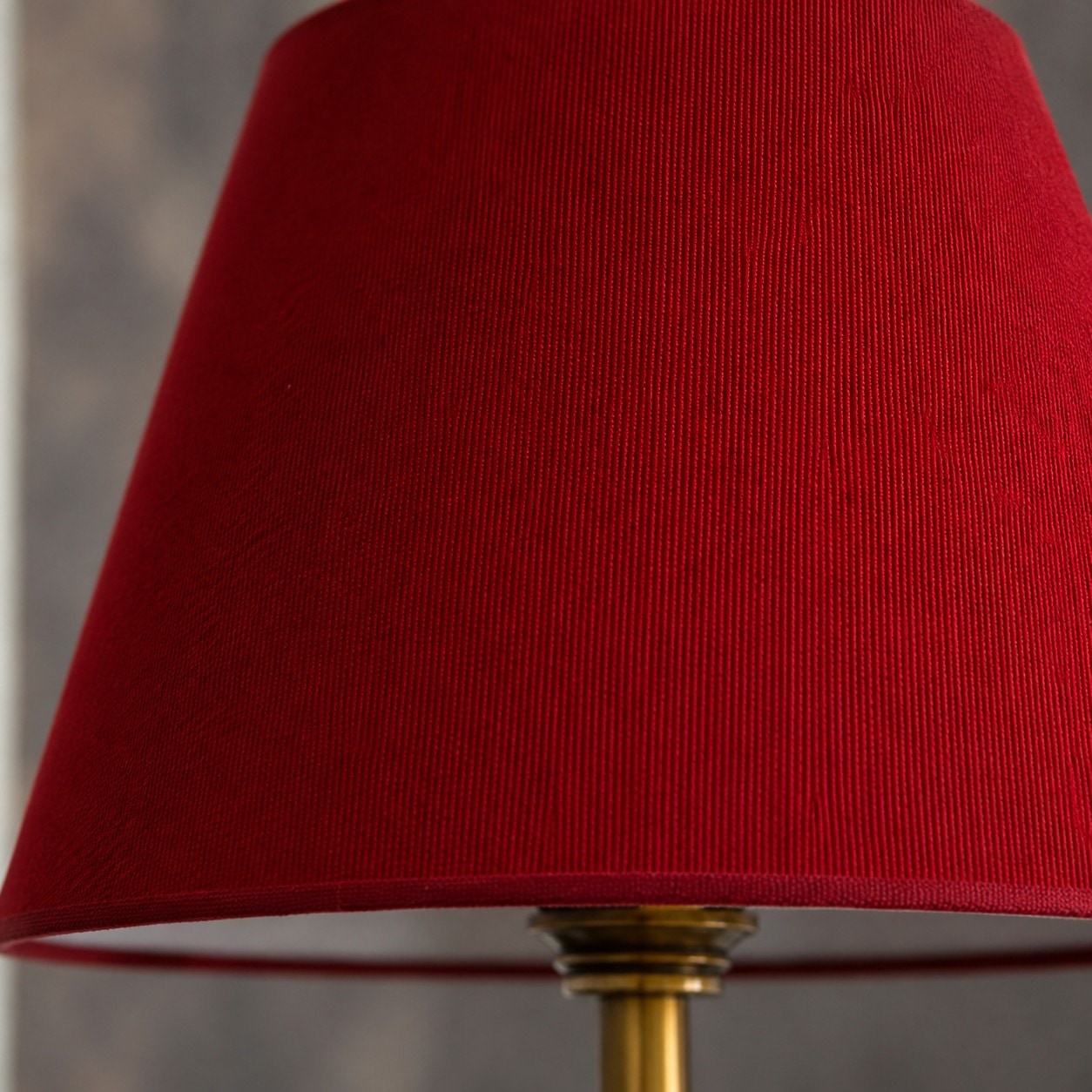 Close view of red fabric lampshade texture