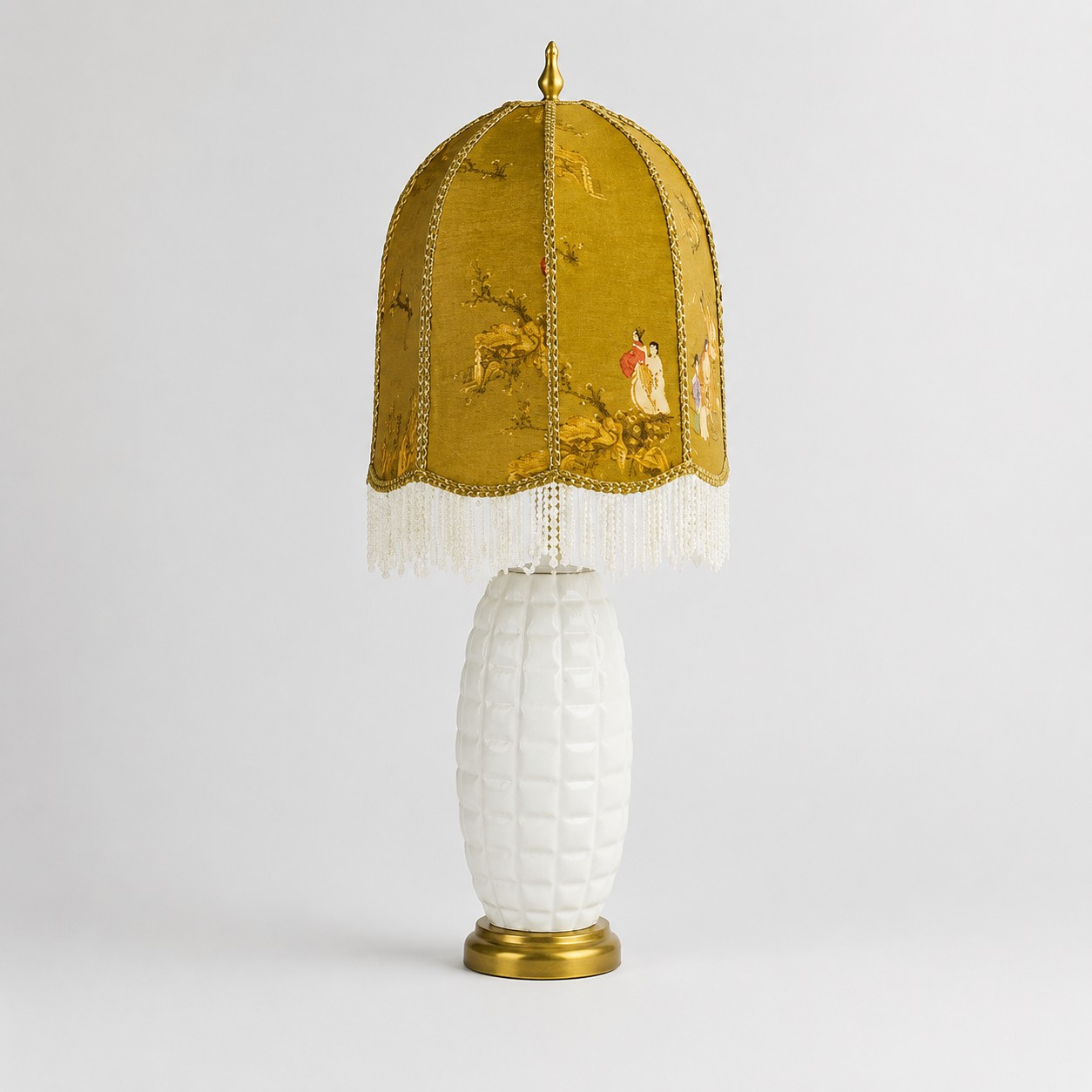 Full view of vintage chinoiserie ceramic table lamp with beaded fringe shade