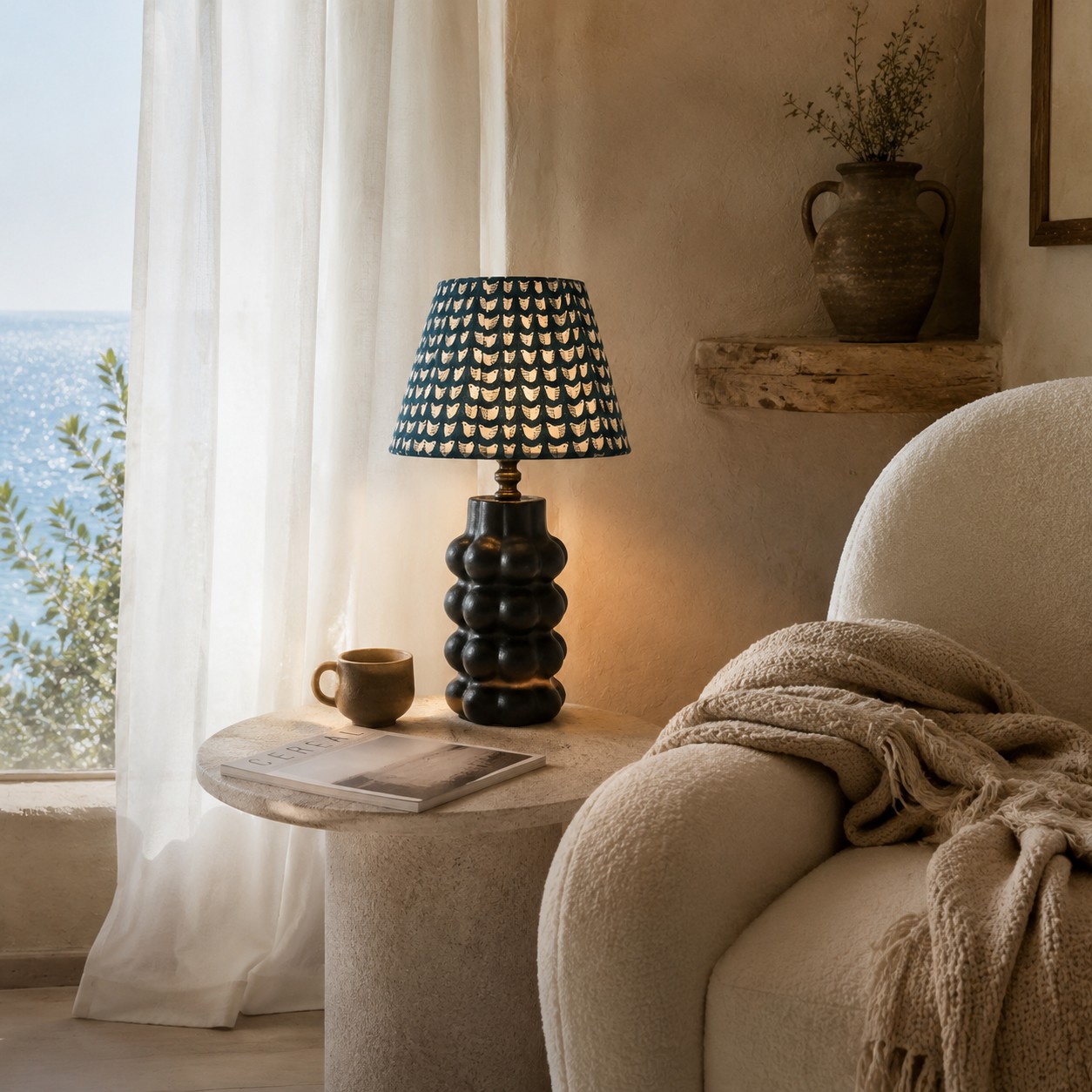 Sculptural ceramic table lamp in a relaxed seating area