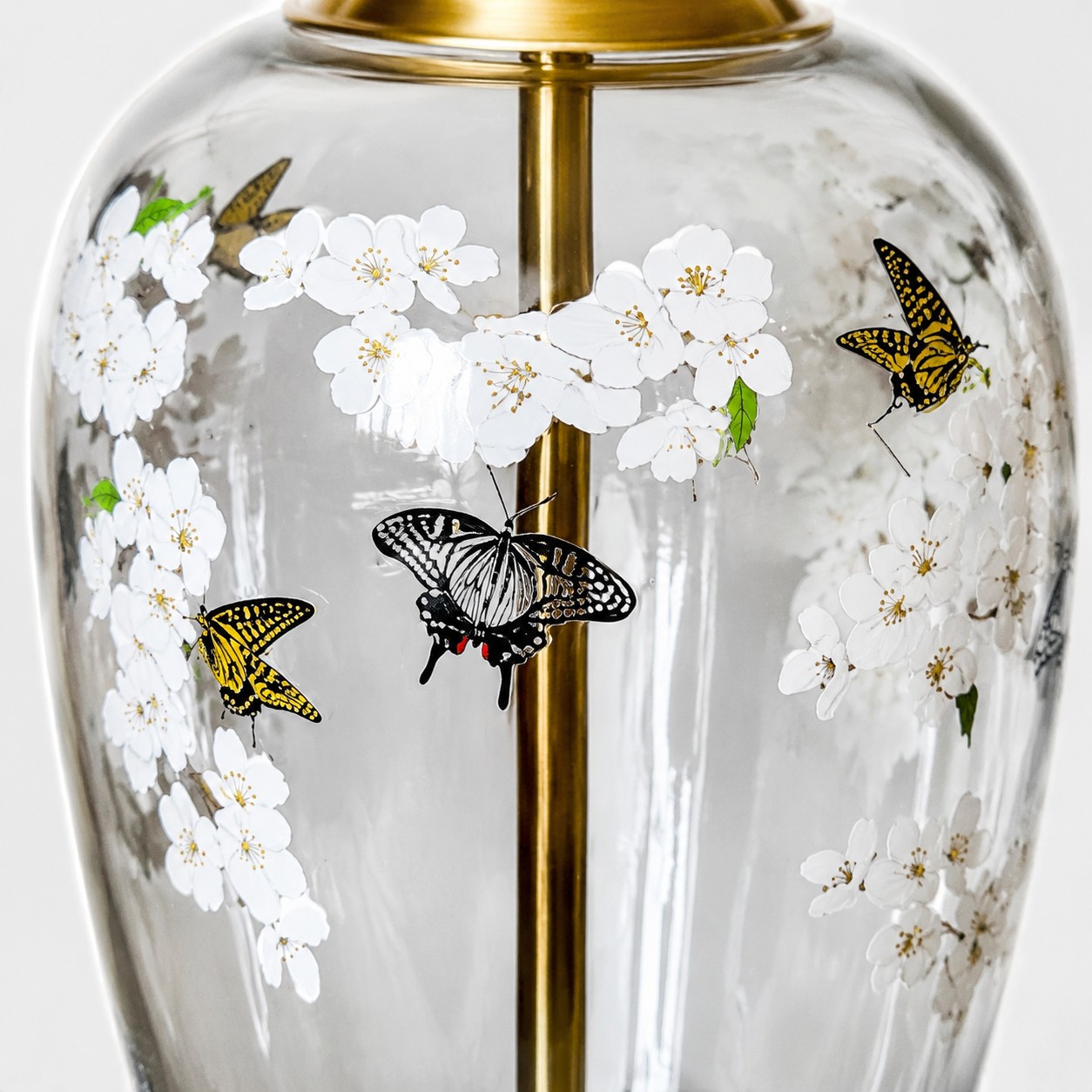 Close view of the floral butterfly glass lamp body