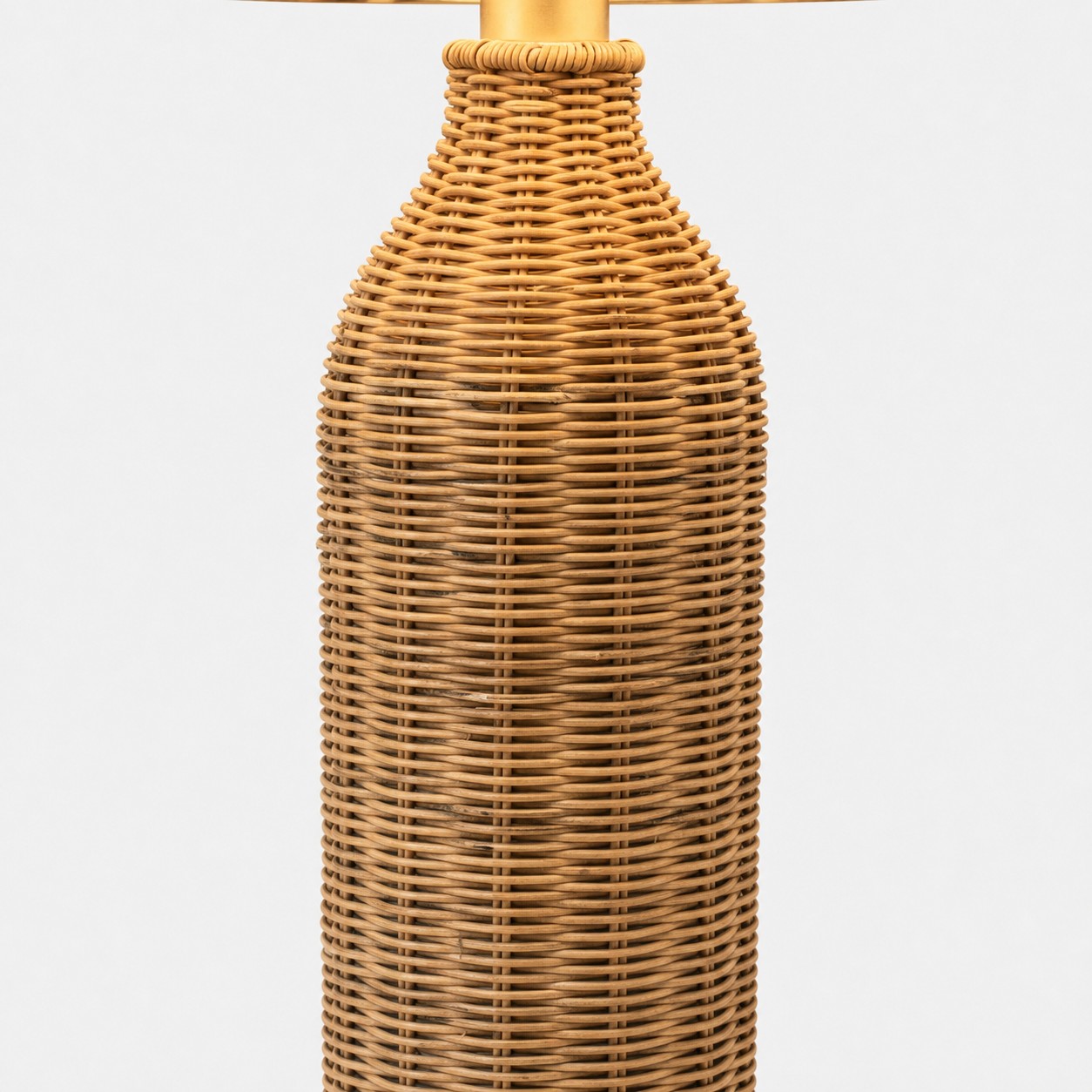 Woven rattan neck and metal lamp fitting detail