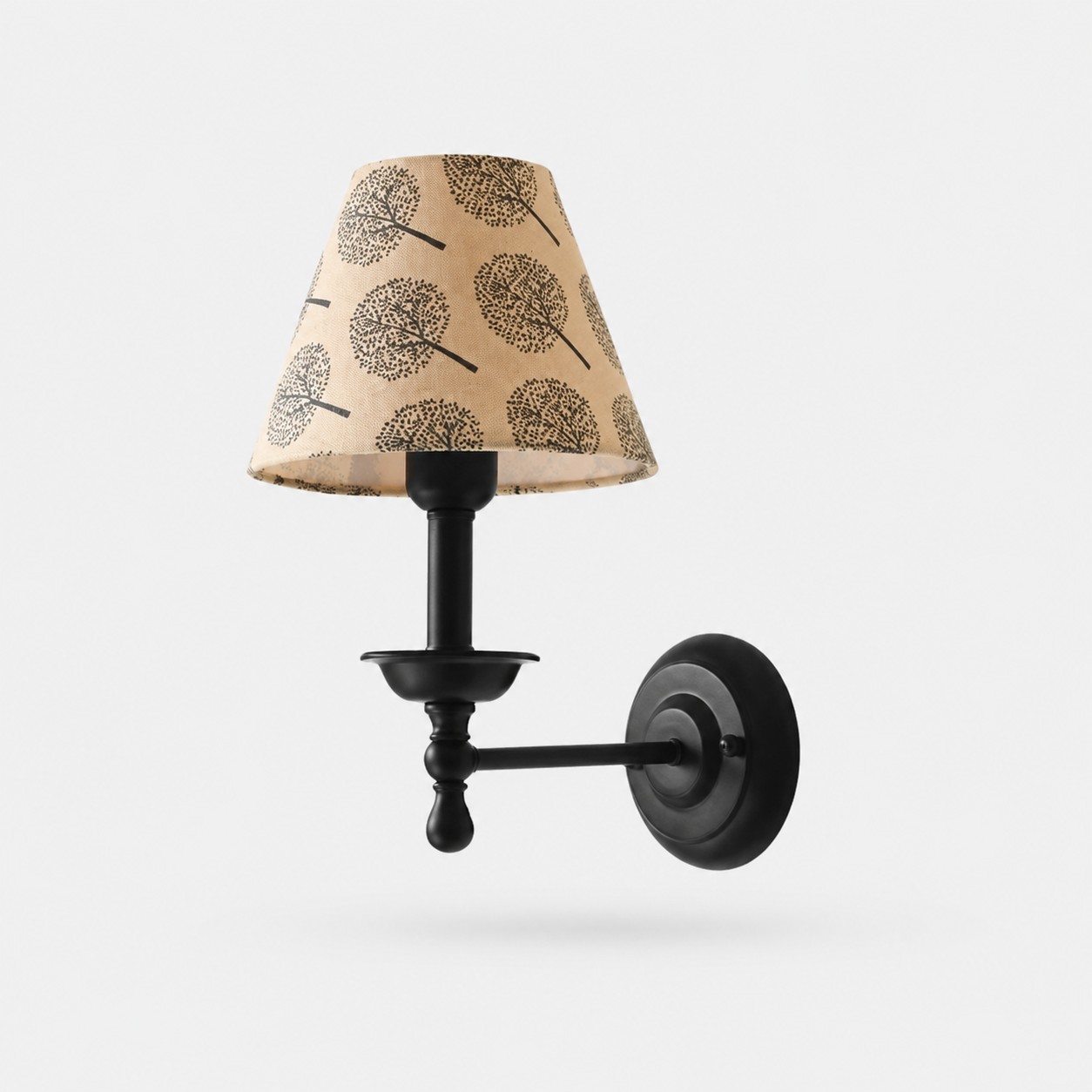 Conical shade wall sconce with wrought iron lamp stand in jungle print shade