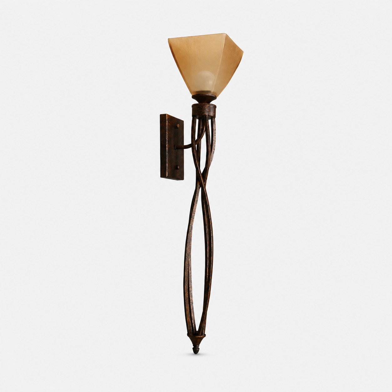 Sculptural aged bronze amber glass wall sconce on a light background