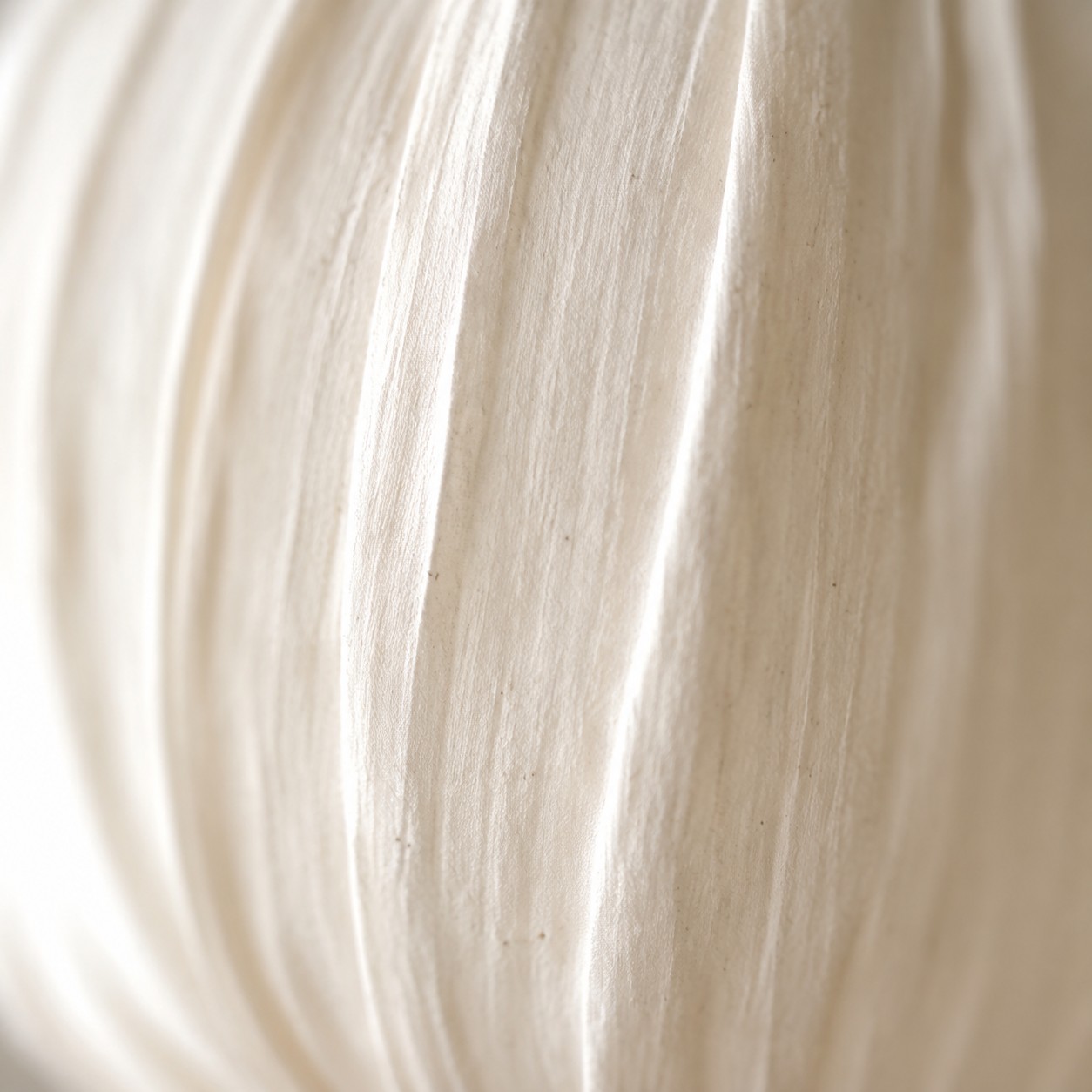 Close view of woven oatmeal fabric shade texture